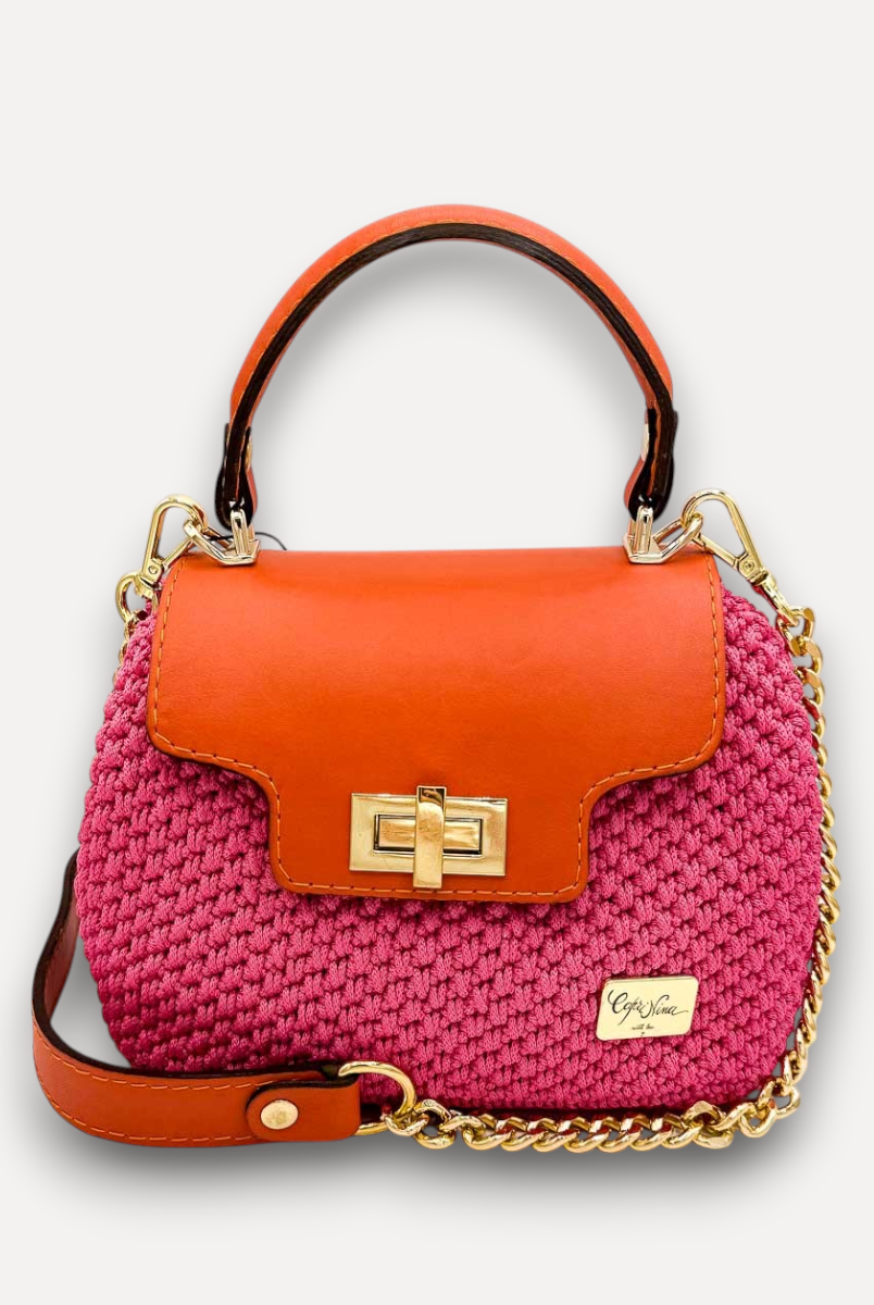 Borsa a mano CapriNina Capriccio in crochet fucsia con patta in pelle arancione e chiusura a girello dorata