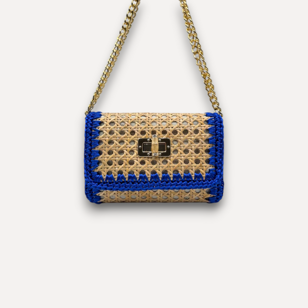 Borsa CapriNina in paglia di Vienna color naturale con dettagli in corda blu e tracolla a catena dorata