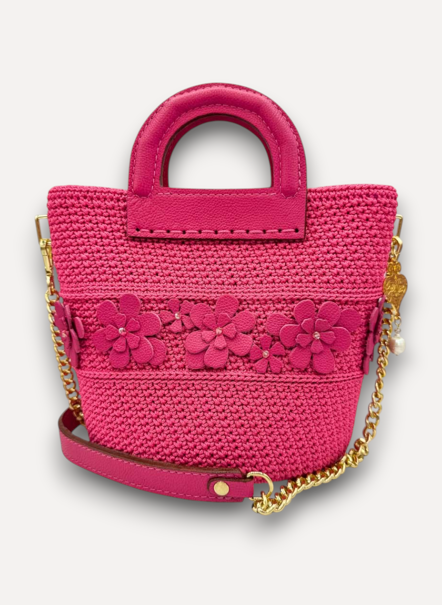 Borsa CapriNina Dodie Flowers fucsia in crochet con dettagli floreali in pelle, manico superiore e tracolla a catena