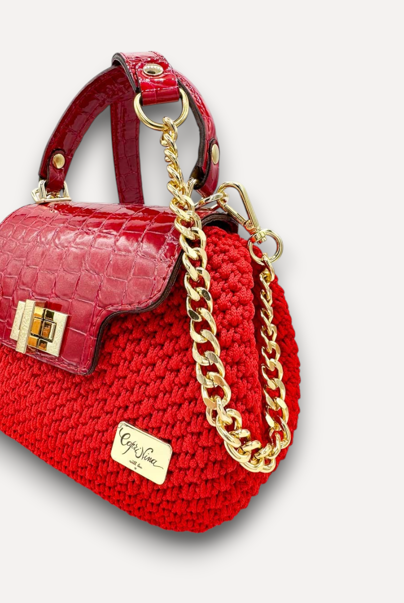 Borsa artigianale CapriNina Capriccio rossa in uncinetto con patta in pelle stampa coccodrillo e dettagli dorati