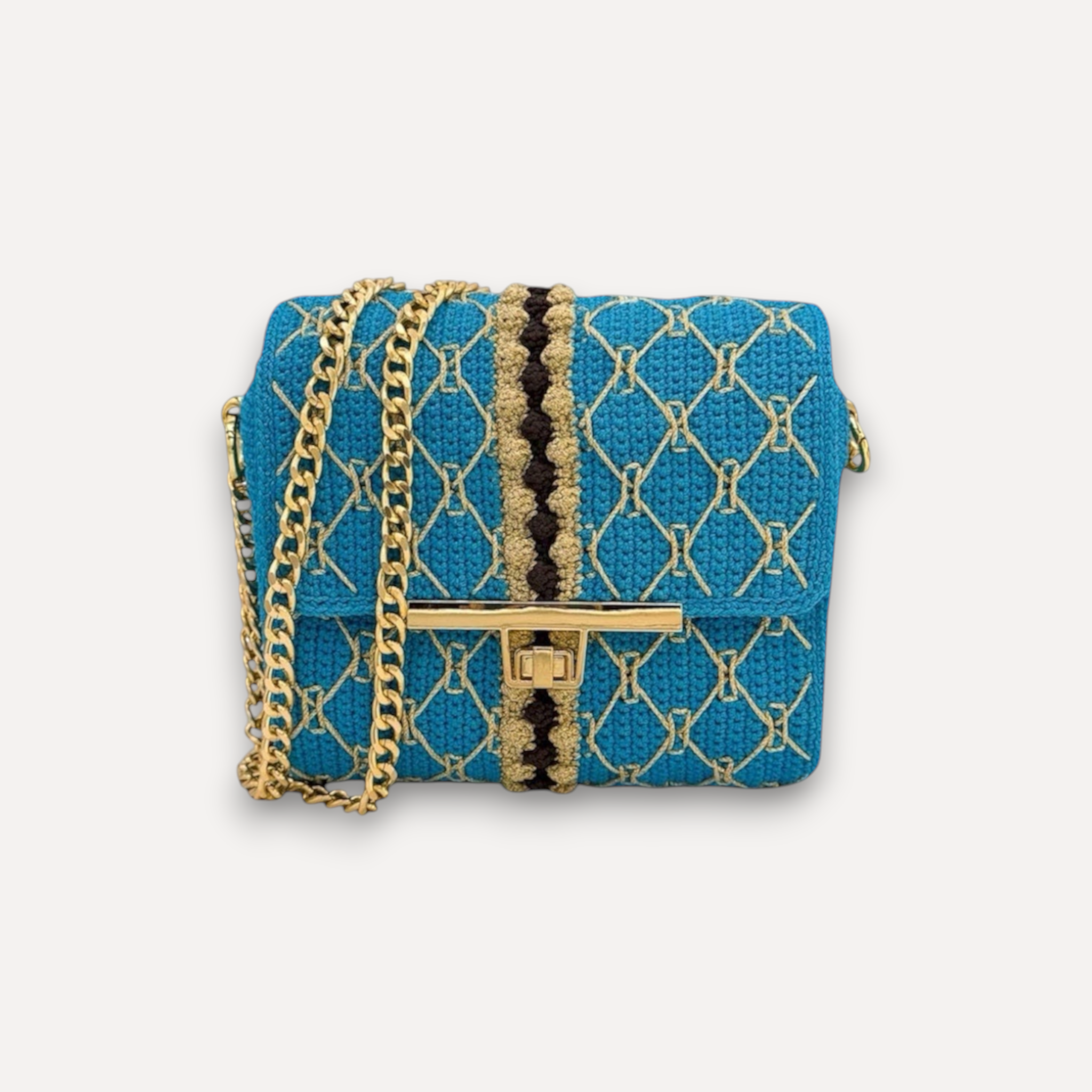 Borsa CapriNina CapriGù all'uncinetto azzurra con ricami dorati, chiusura a girello e tracolla a catena regolabile.