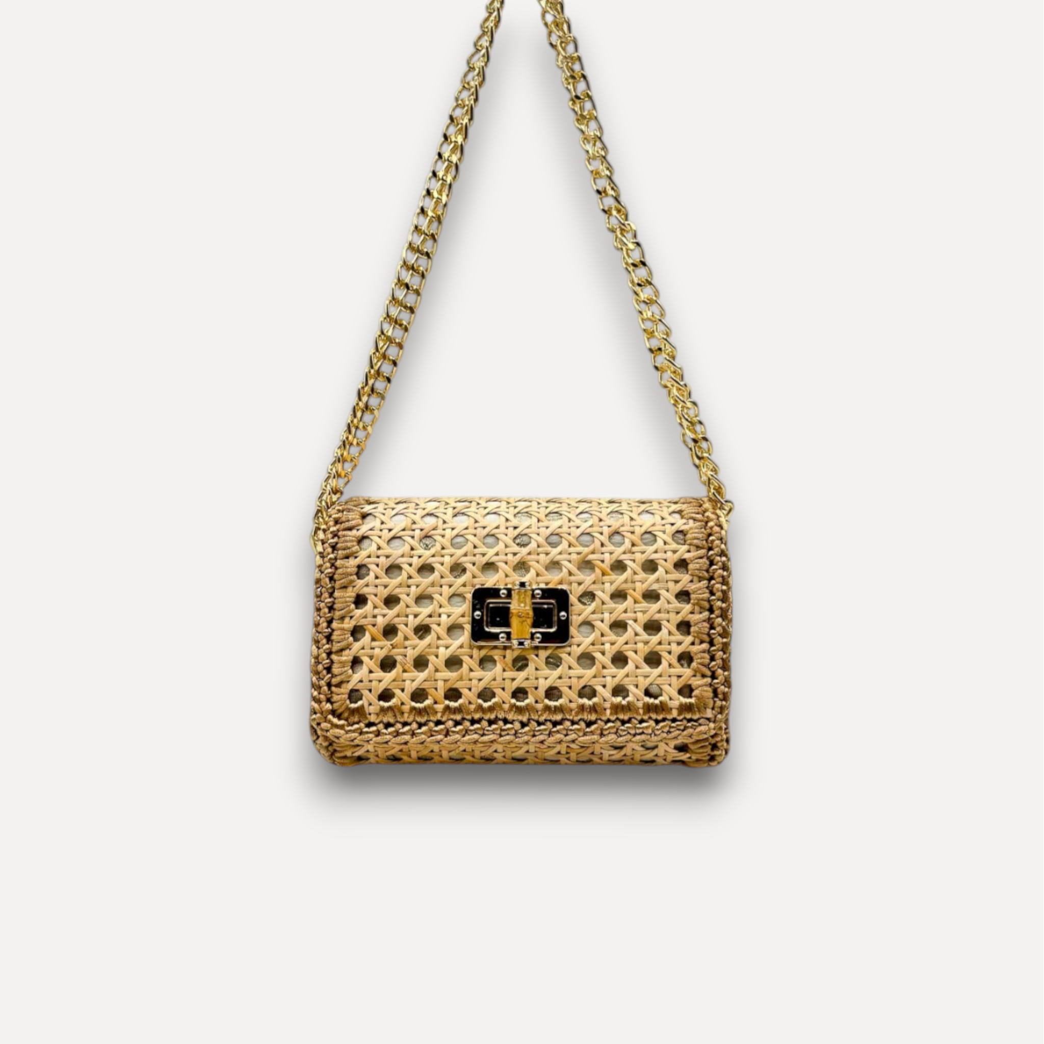 Borsa CapriNina Vienna in paglia intrecciata color naturale con tracolla a catena dorata e chiusura metallica elegante
