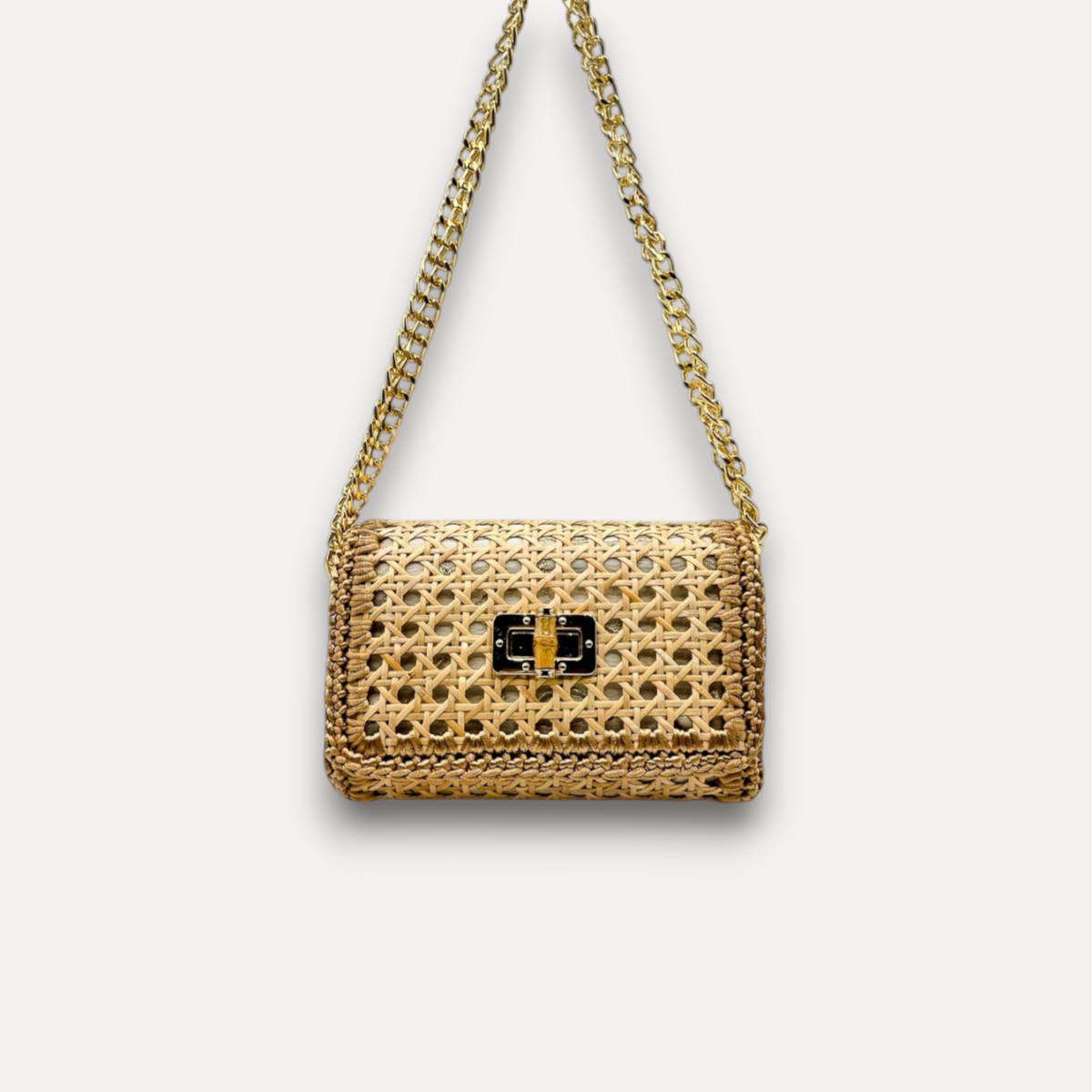 Borsa CapriNina Vienna in paglia intrecciata color naturale con tracolla a catena dorata e chiusura metallica elegante