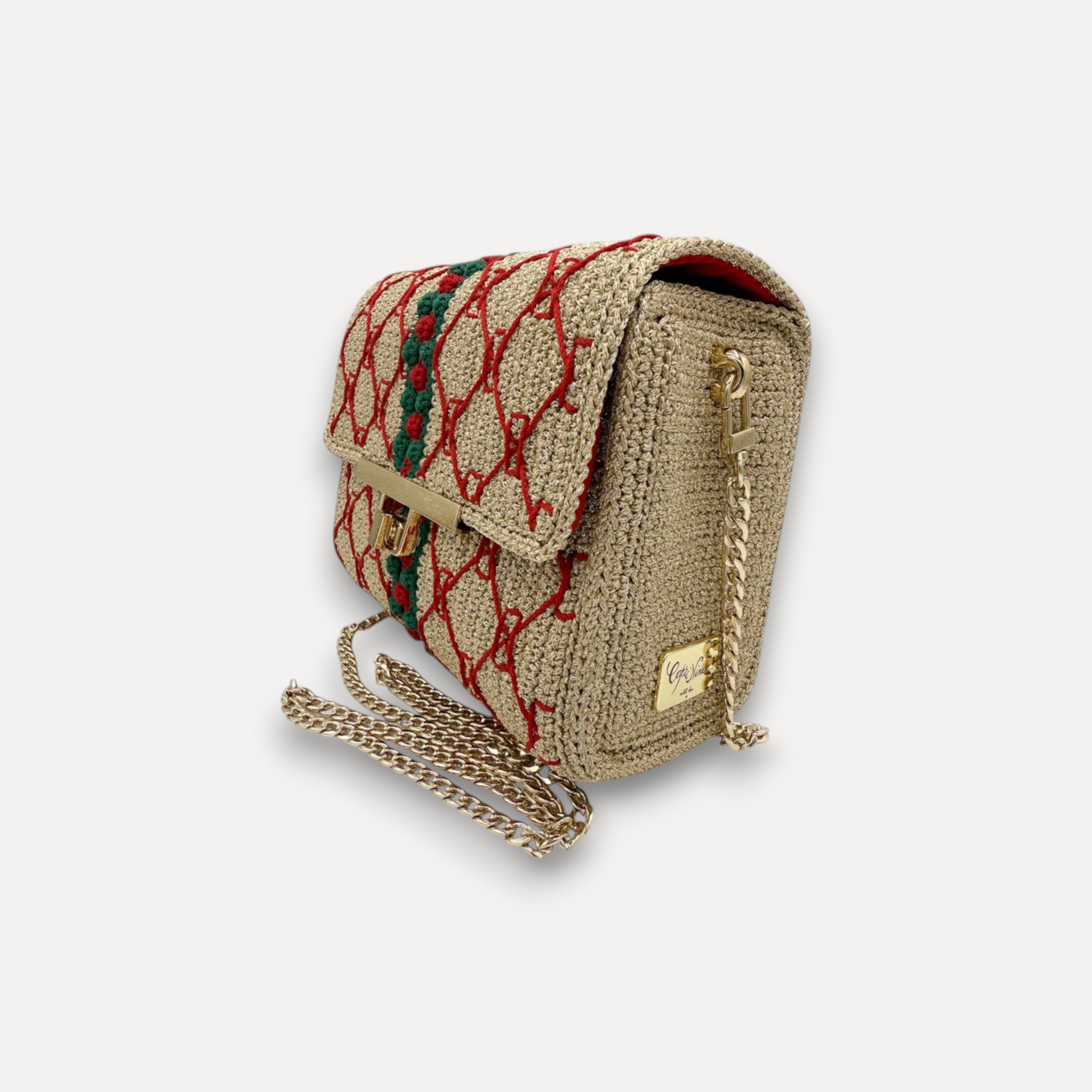 Borsa CapriNina CapriGù lavorata all'uncinetto color beige con ricami rossi e verdi, chiusura a incastro e catena oro