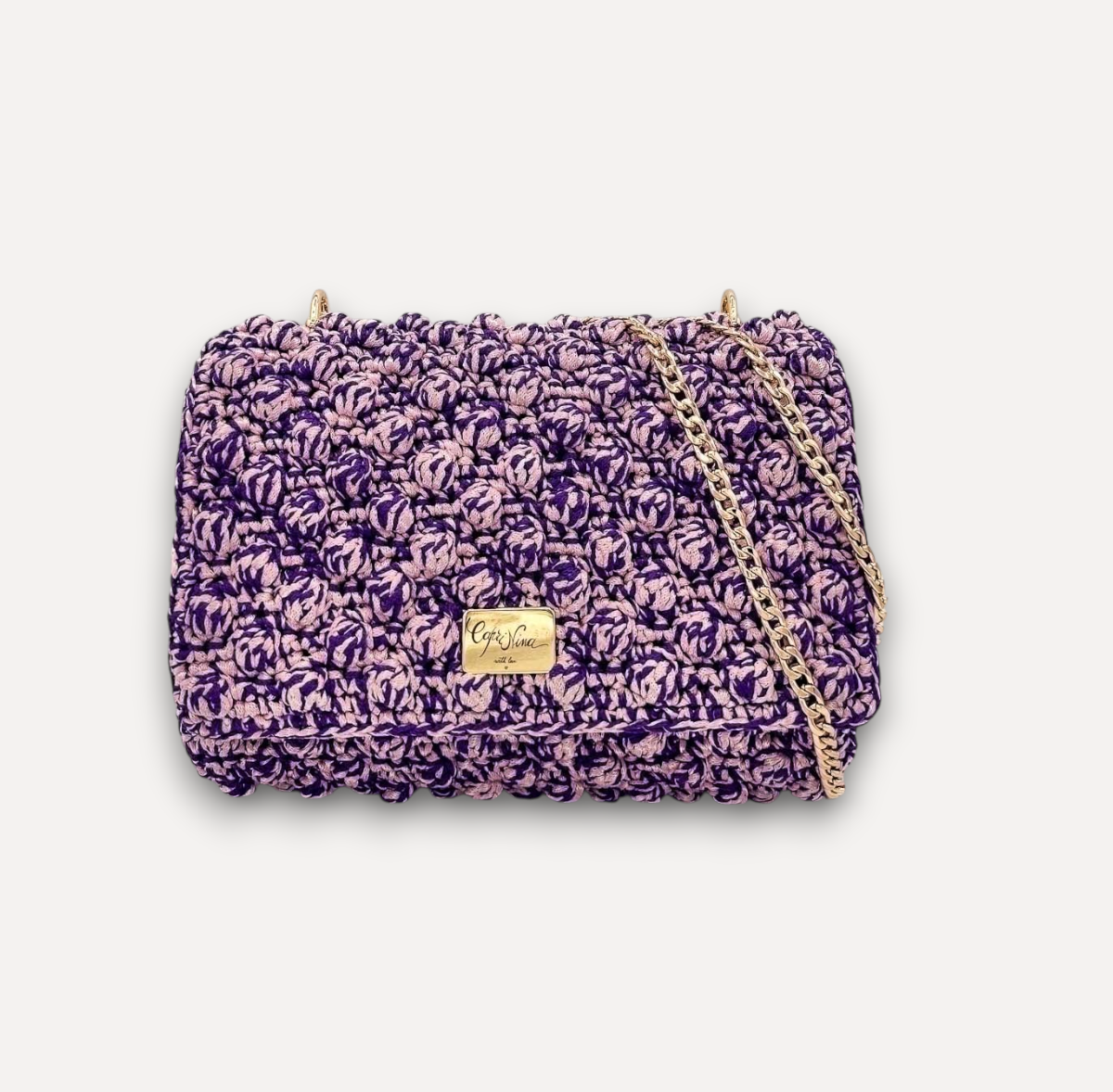 Borsa a tracolla CapriNina Ninetta Middle lavorata all'uncinetto in corda viola e rosa con catena dorata regolabile