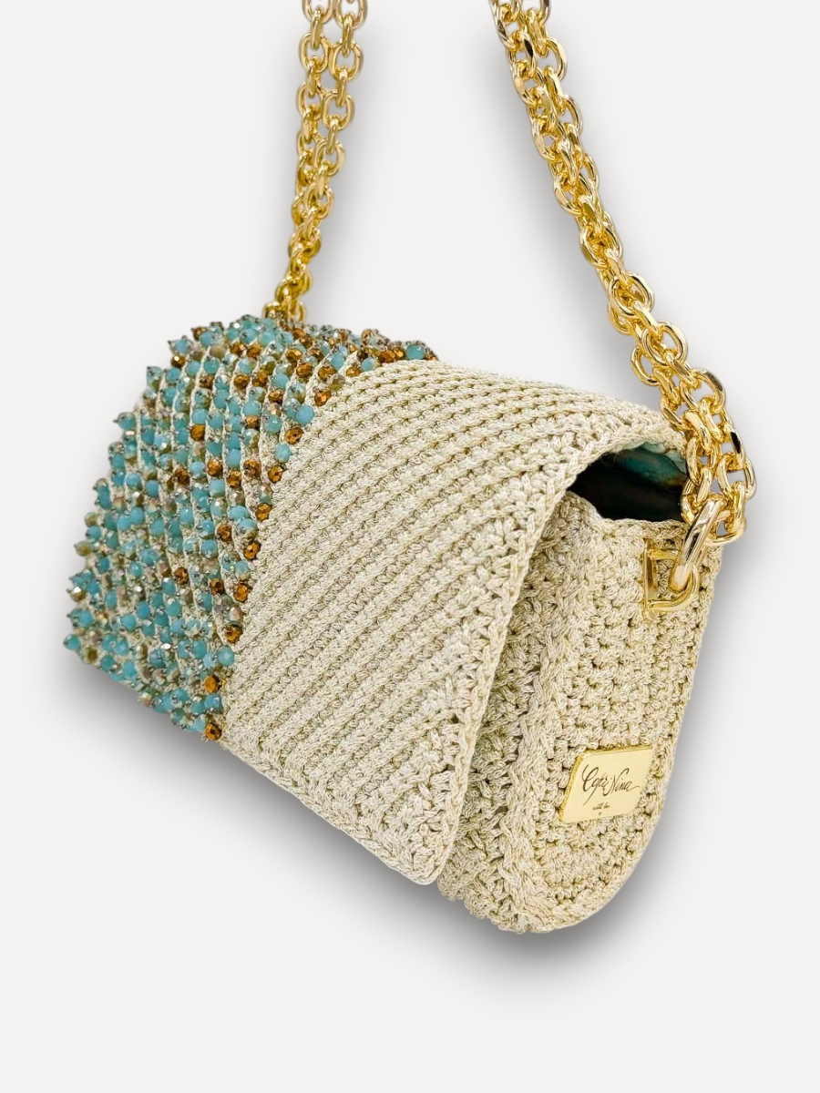Borsa all'uncinetto CapriNina Ninetta Special color crema con cristalli azzurri e dorati e tracolla a catena dorata