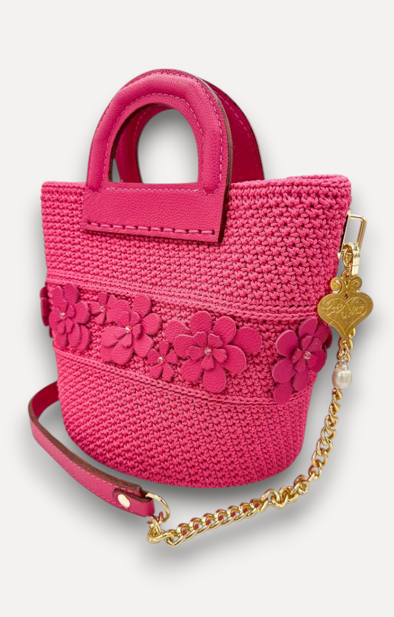 Borsa a mano e a tracolla CapriNina Dodie Flowers in crochet fucsia con dettagli floreali in pelle e catena dorata