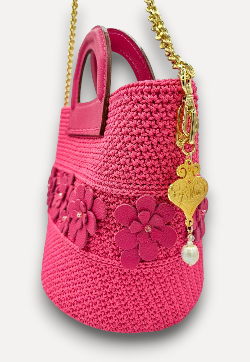 Borsa CapriNina Dodie Flowers fucsia in crochet con fiori in pelle, manico rigido e tracolla a catena dorata