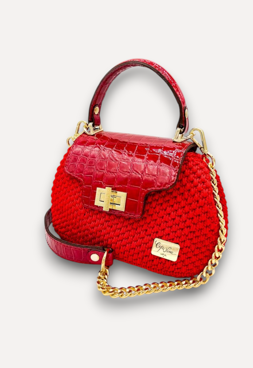 Borsa a mano CapriNina Capriccio rossa in uncinetto con patta in pelle stampa coccodrillo e chiusura a girello oro