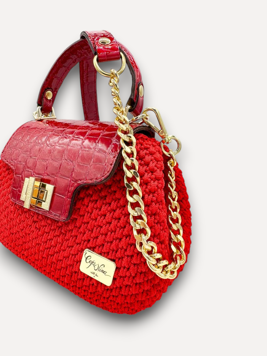 Borsa artigianale CapriNina Capriccio rossa in uncinetto con patta in pelle stampa coccodrillo e dettagli dorati